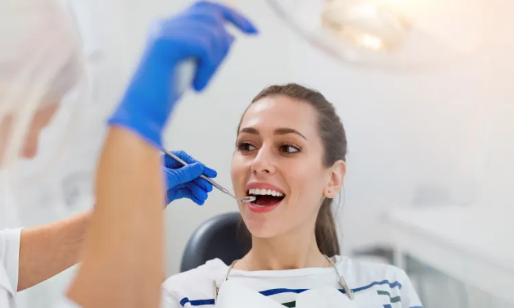 How Often Should You Really Get Your Teeth Cleaned? in AH Smiles